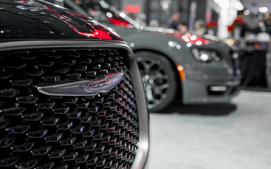 Chrysler badge on front grille at auto show