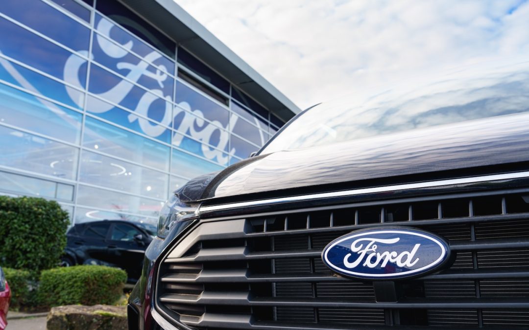 Ford logo on vehicle parked outside dealership