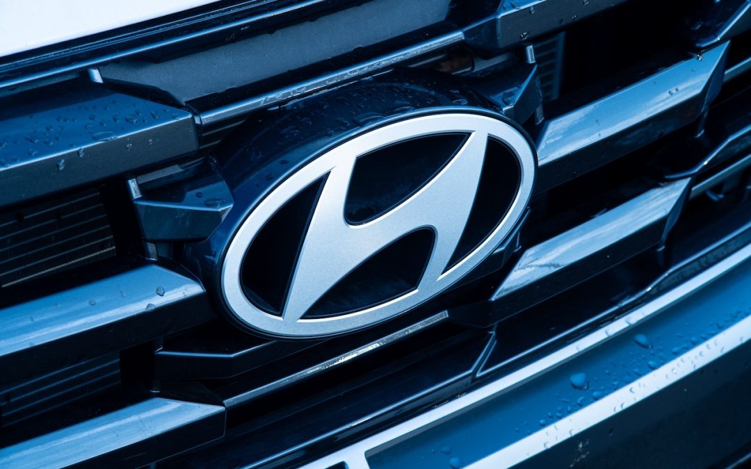Hyundai front grille badge at certified collision repair facility in Charlotte NC